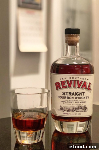 Jimmy Red Corn Saved From Extinction for Whiskey and Grits 9 Glass and bottle of bourbon made from heirloom red corn