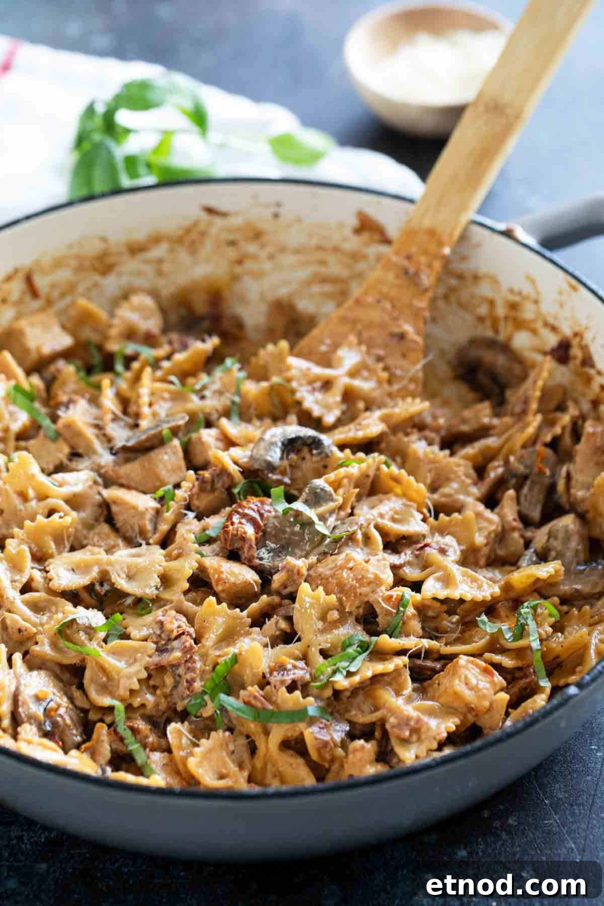 Creamy Milano Chicken Pasta Recipe for Weeknight Dinners 8 Large skillet filled with Chicken Pasta Milano.