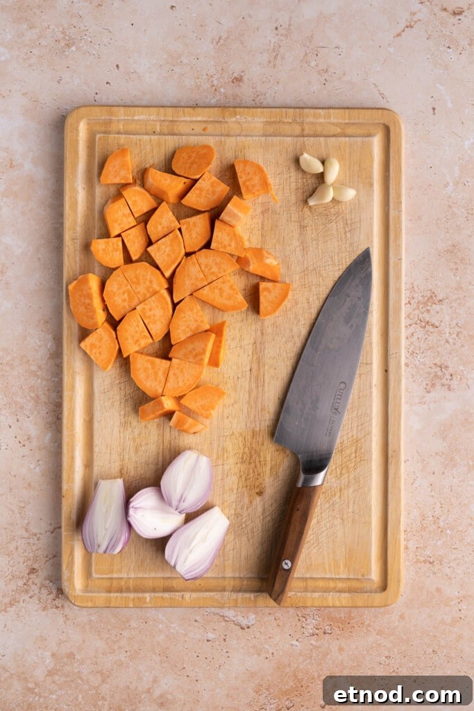 30-Minute Creamy Sweet Potato Pasta Sauce Recipe 4 Prepped sweet potato, shallots, and garlic.