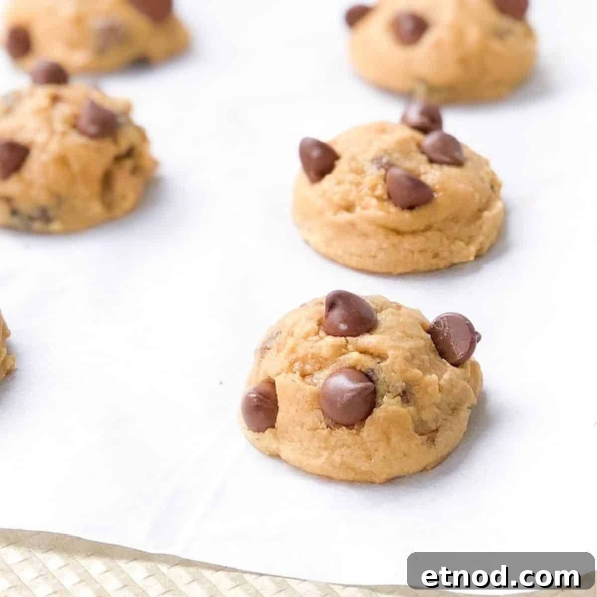 Mocha chocolate chip pudding cookies baked on a baking sheet.