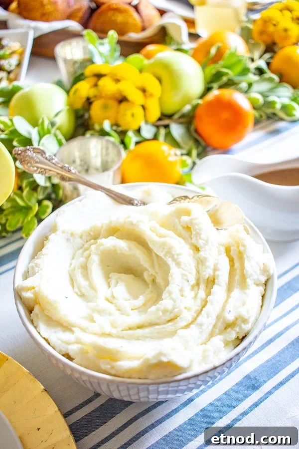 Cauliflower Mashed Potatoes Cauliflower Mashed Potatoes | Adding cauliflower to mashed potatoes is an easy way to reduce the carbs and calories. This easy Cauliflower Mashed Potato recipe is a slightly healthier side dish to add to your #Thanksgiving menu.