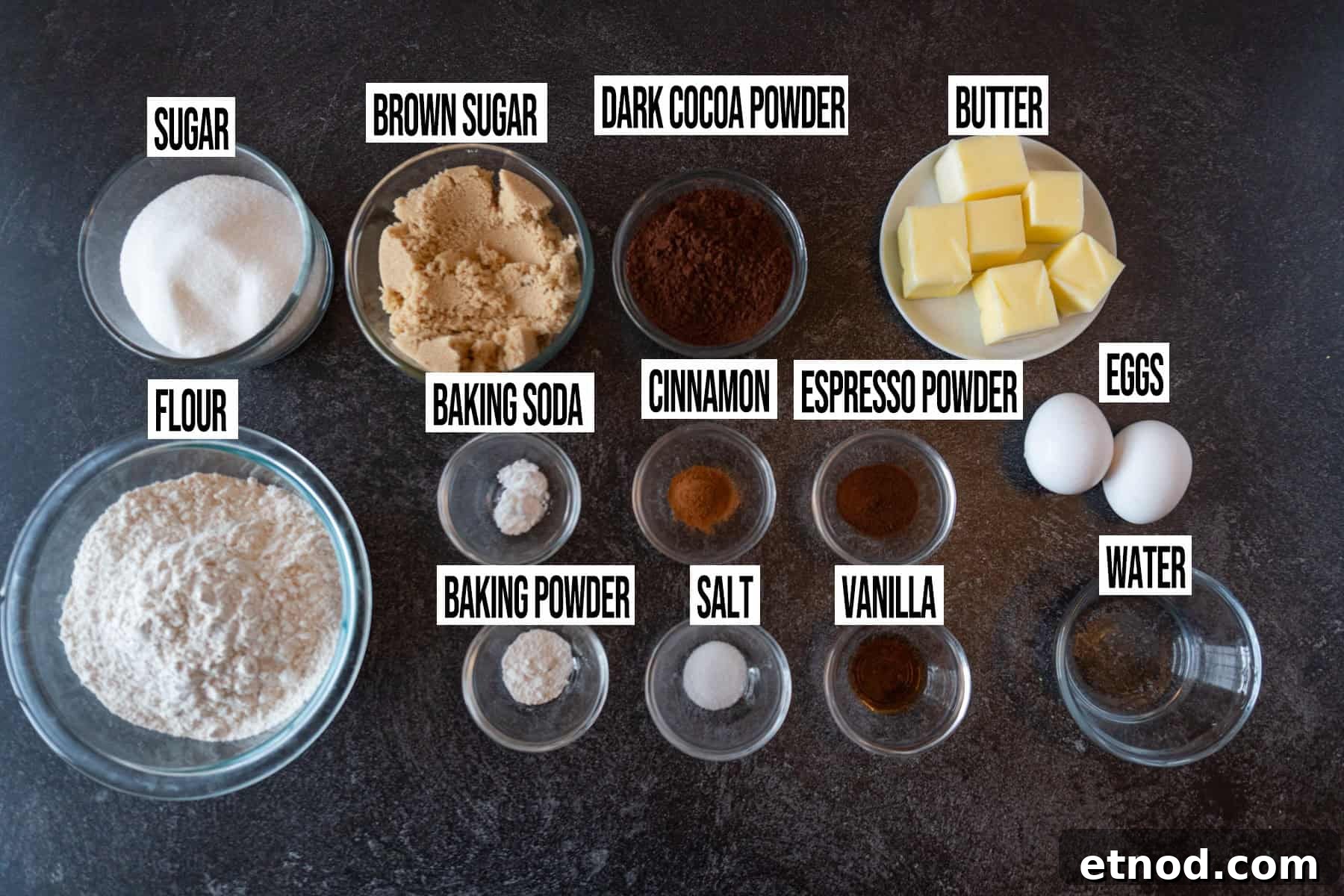 Chocolate Sugar Cookies ingredients in individual bowls and labeled.