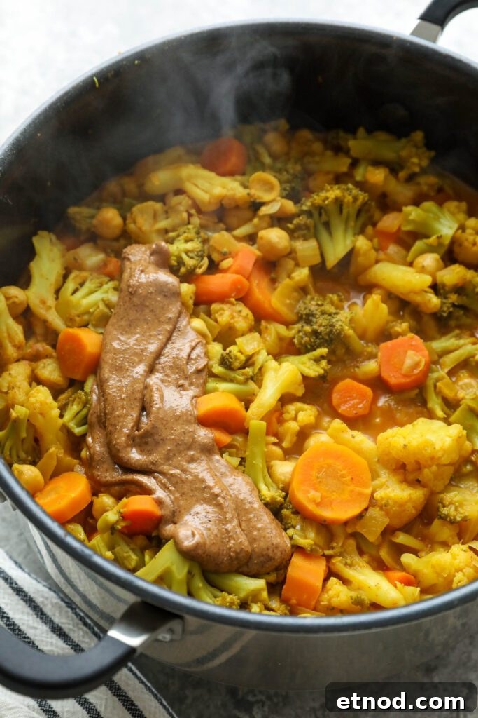 Creamy Vegan Vegetable Korma Recipe — Flavorful Indian Curry 7 vegetable korma with almond butter added by Flora & Vino