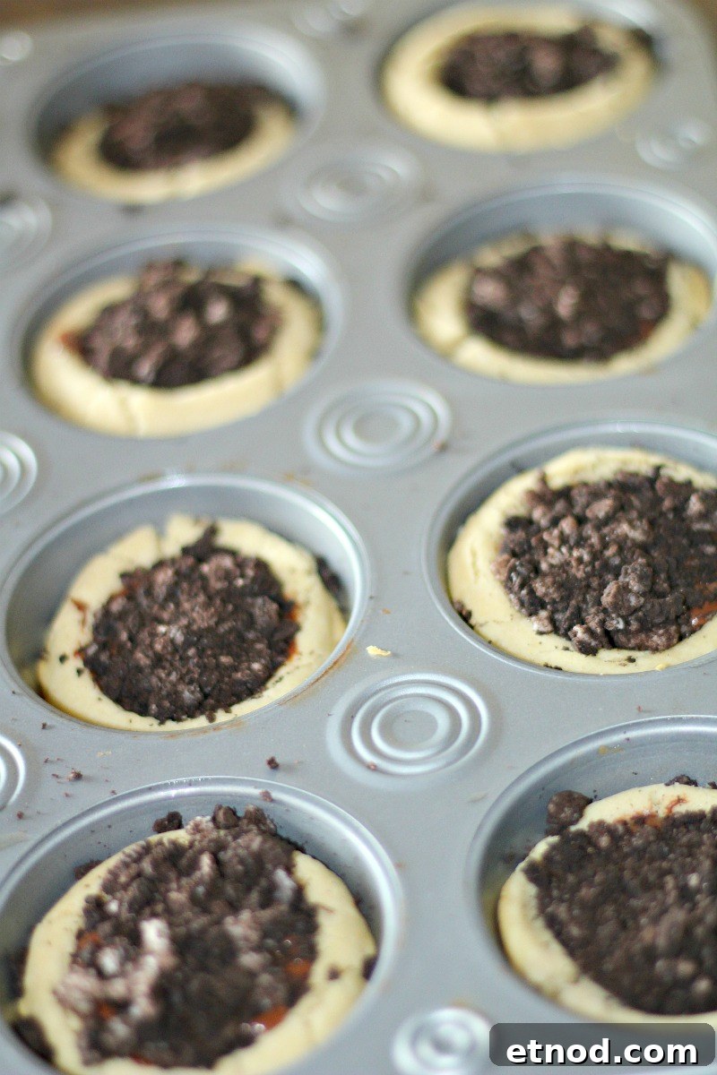 Cookie cups with Nutella and Oreo crumbs