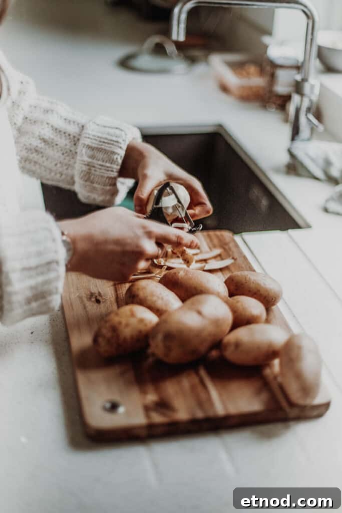 Creamy Leek and Mushroom Pie Recipe for Cozy Dinners 3 peeling potatoes