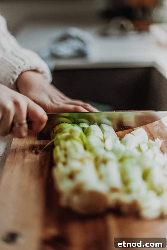Creamy Leek and Mushroom Pie Recipe for Cozy Dinners 4 chopping leeks into slices