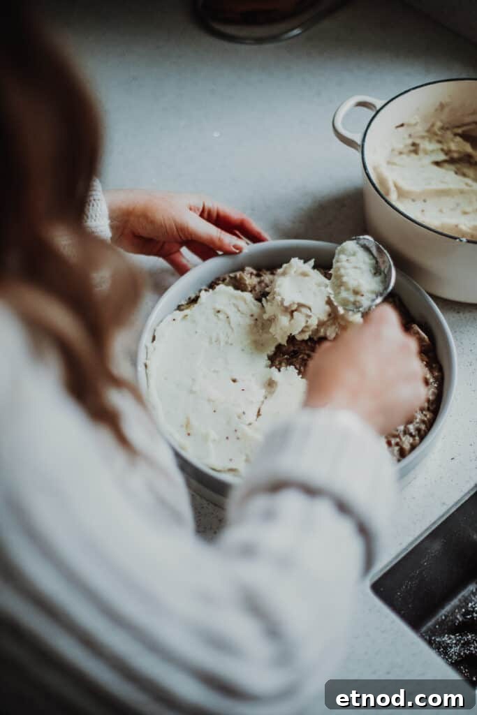 Creamy Leek and Mushroom Pie Recipe for Cozy Dinners 7 topping the leek & mushroom pie with mash potato