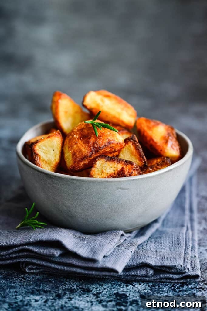 Crispy Roast Potatoes Cooked in Goose Fat 2 Bowl of crispy golden roast potatoes