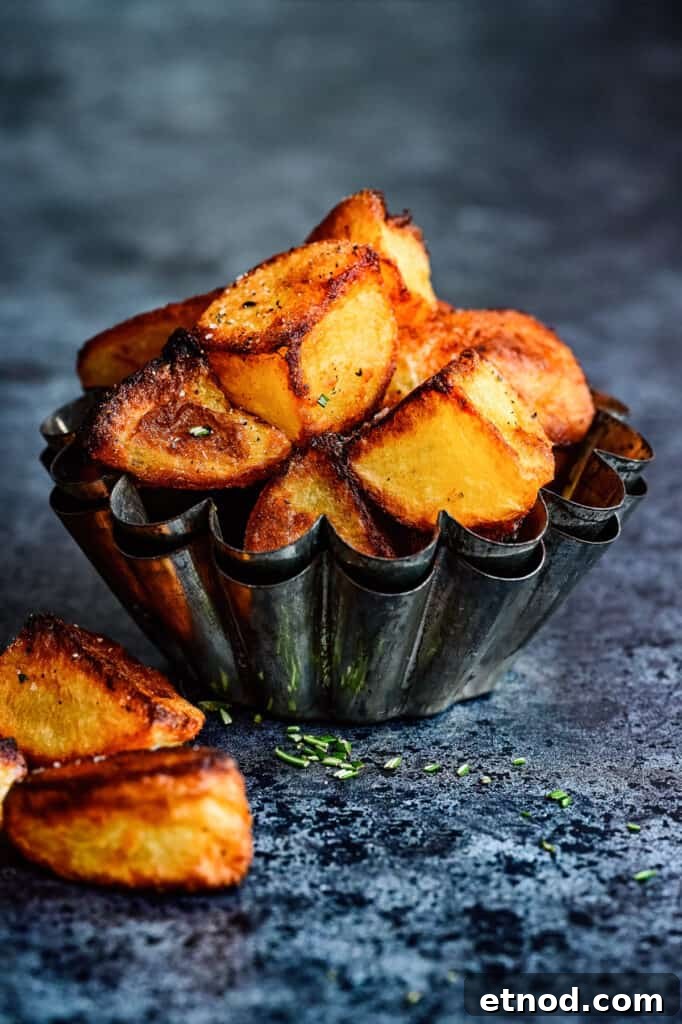 Crispy Roast Potatoes Cooked in Goose Fat 4 Goose Fat Roasties in a vintage baking tin