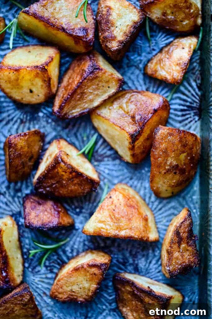 Crispy Roast Potatoes Cooked in Goose Fat 8 close up on crispy goose fat roast potatoes on tray