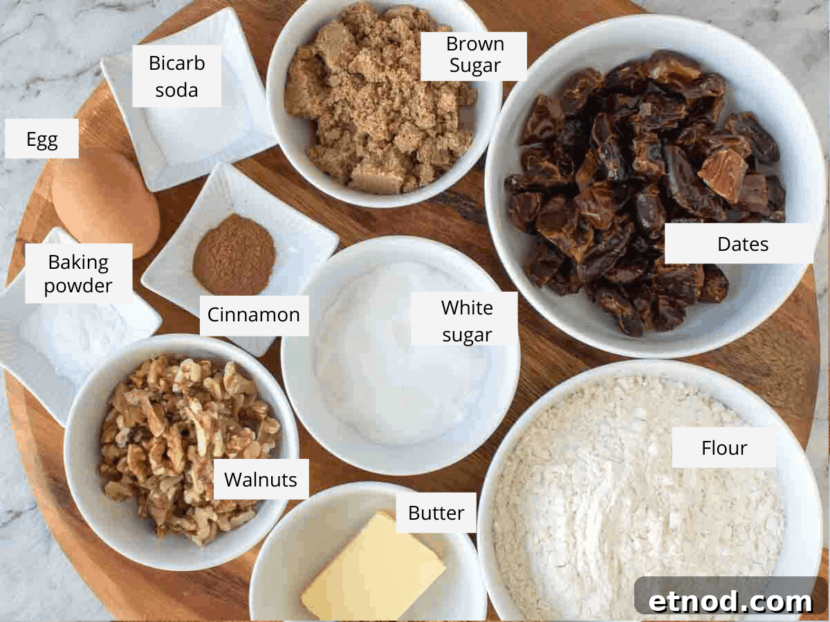Moist Date and Walnut Bread Recipe for Homemade Comfort 3 ingredients on wooden board - baking powder, brown and white sugar, dates, flour, butter, walnuts, baking soda, egg and cinnamon