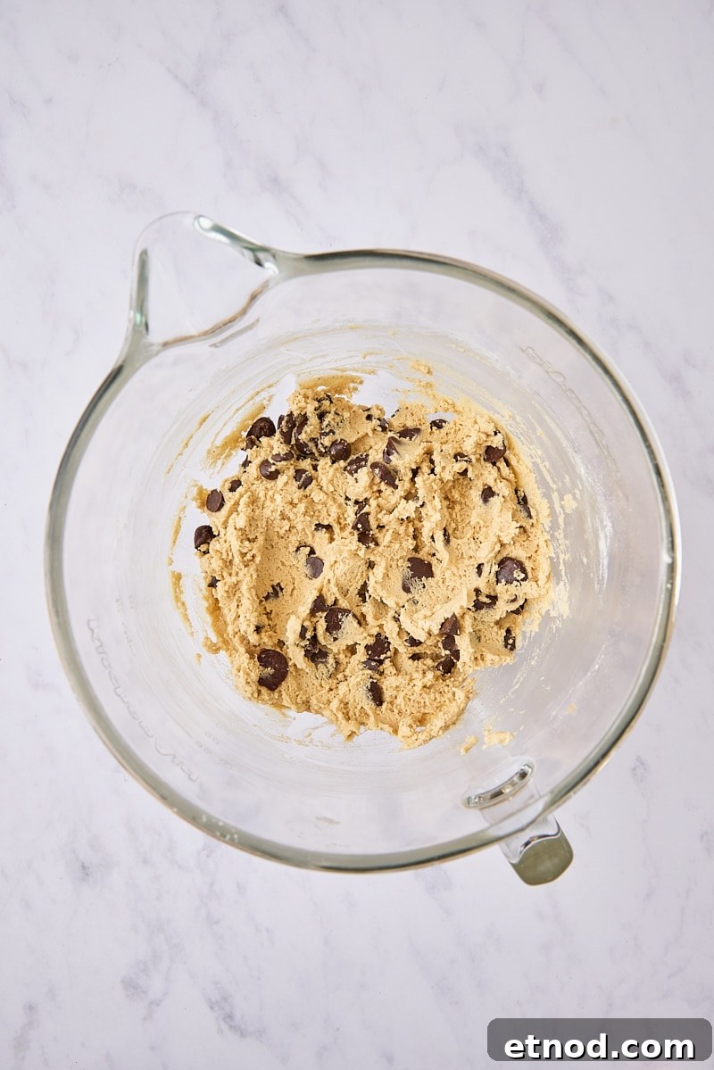 Brown Butter Chocolate Chip Cookies with Extra Chewiness 11 Brown butter chocolate chip cookie dough in glass mixer bowl