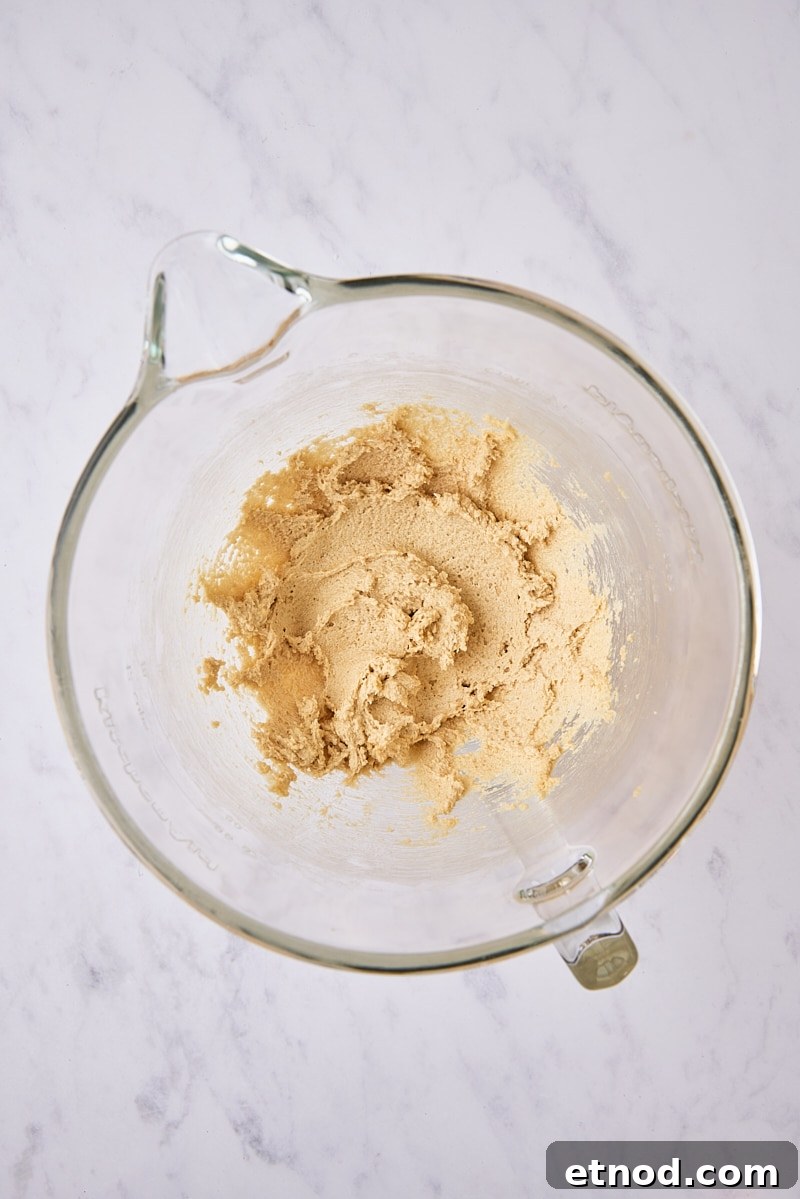 Brown Butter Chocolate Chip Cookies with Extra Chewiness 5 Butter and sugars mixed until soft and creamy in glass mixing bowl