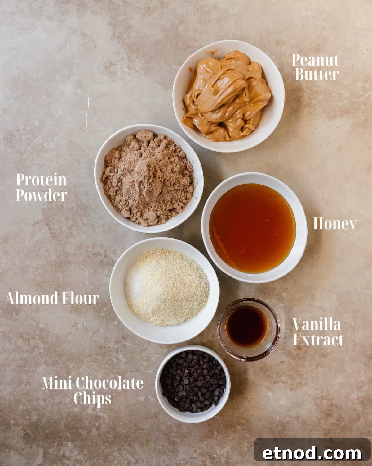 High-Protein Peanut Butter Energy Bites 3 Gather peanut butter, protein powder, honey or maple syrup, almond flour, vanilla extract, salt and chocolate chips.