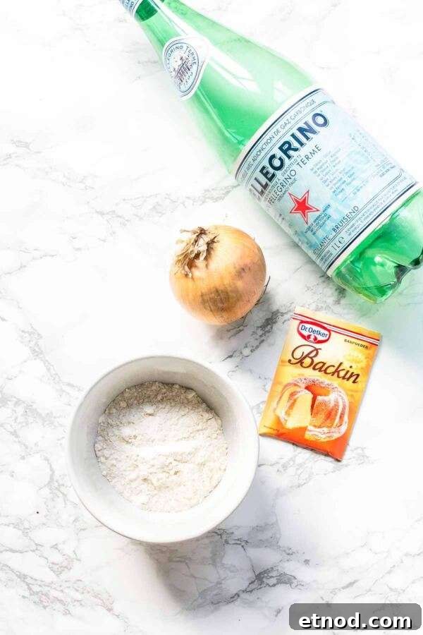 Ingredients for making homemade onion rings.