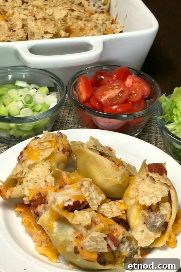 Pasta Shell Tacos Recipe: Crispy Taco Filling in Pasta Shells 2 Casserole dish Pasta Shell Tacos tacos are a fun twist on traditional tacos. Served with green onions, tomatoes, lettuce and sour cream
