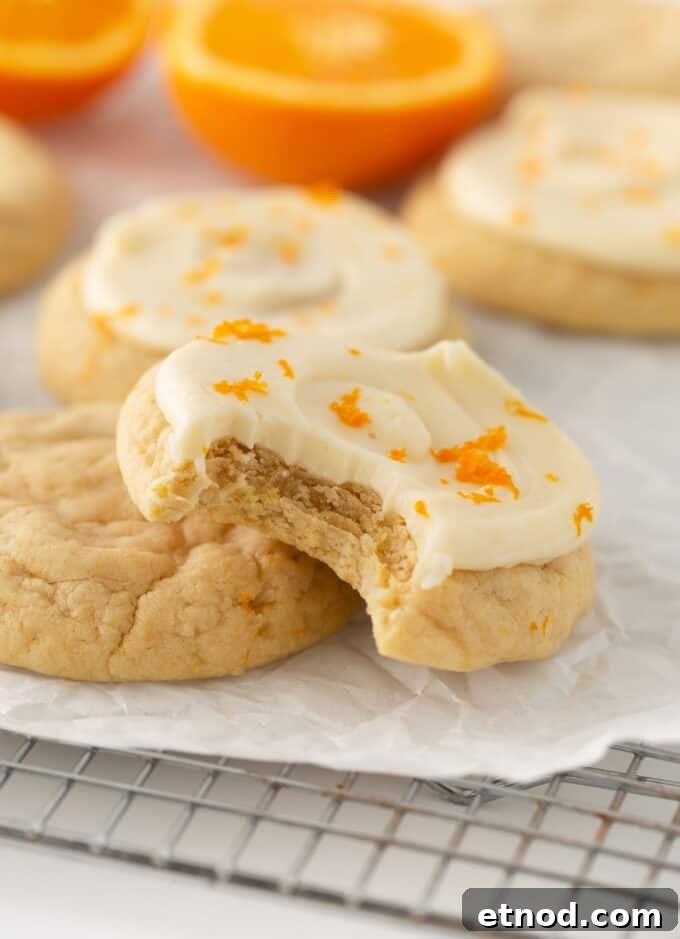 Frosted Orange Sugar Cookies Recipe with Zesty Glaze 11 frosted orange sugar cookies on wire cooling rack
