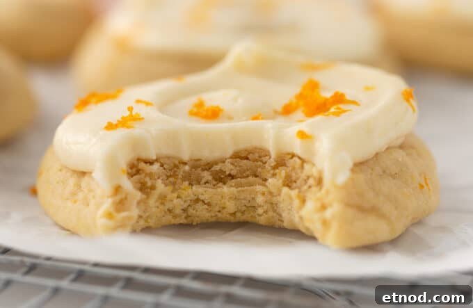 Frosted Orange Sugar Cookies Recipe with Zesty Glaze 3 stack of orange sugar cookies