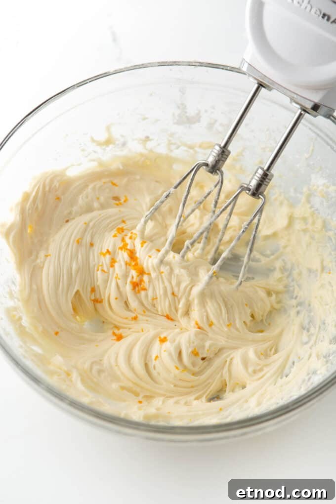 Frosted Orange Sugar Cookies Recipe with Zesty Glaze 9 bowl of orange cream cheese frosting for cookies