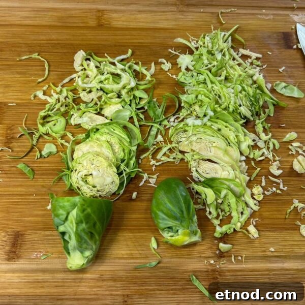Shaved Brussels Sprouts Salad with Pomegranate and Pecans 3 two Brussels sprouts cut in different directions