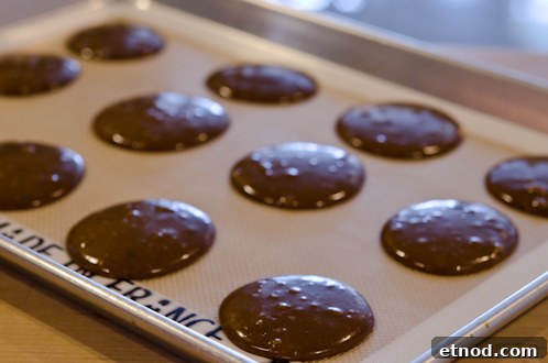 Soft Ginger Cookies with Orange Glaze Recipe 10 Soft ginger cookie batter on a cookie sheet.
