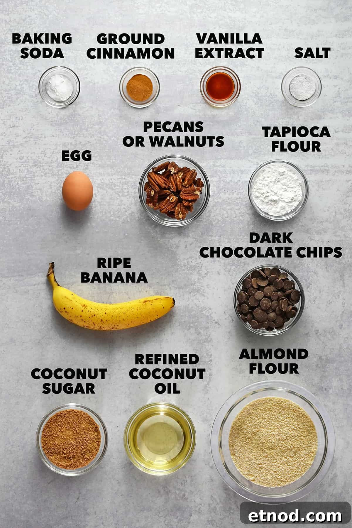 Soft Banana Chocolate Chip Cookies — Paleo Grain-Free Recipe 4 All the raw ingredients to make paleo banana cookies are measured out in small glass bowls.