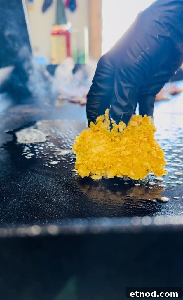 adding french toast to griddle