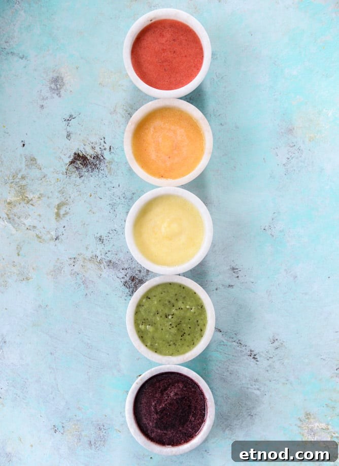 Rainbow Fruity Frozen Yogurt Popsicles: Refreshing Summer Treat 3 rainbow froyo pops I howsweeteats.com