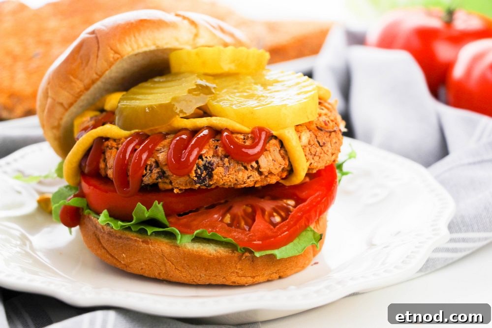 bean burger on bun with condiments vegan