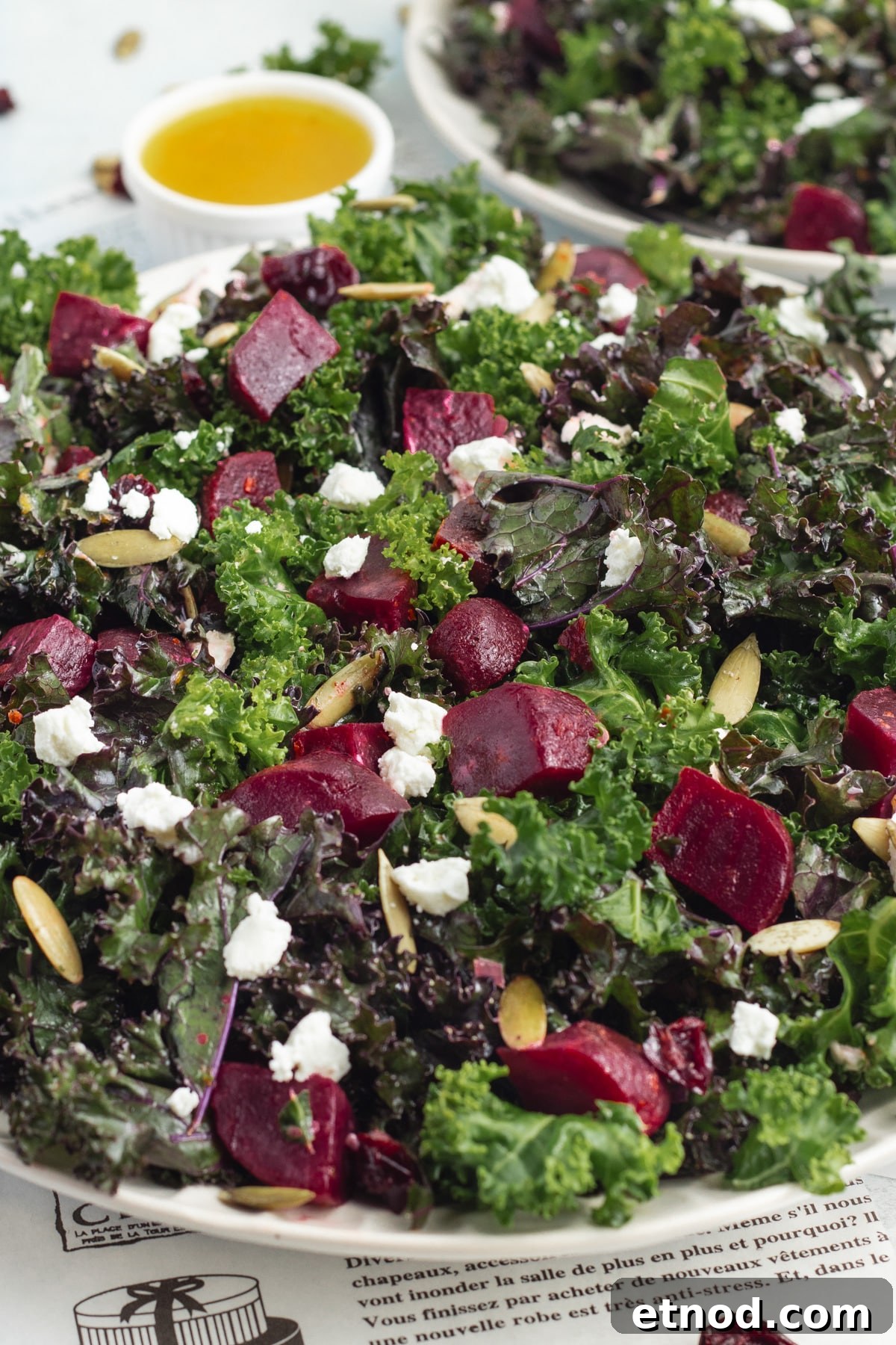 Kale Salad with Roasted Beets and Orange Vinaigrette 2 This is a picture of kale salad with beets.