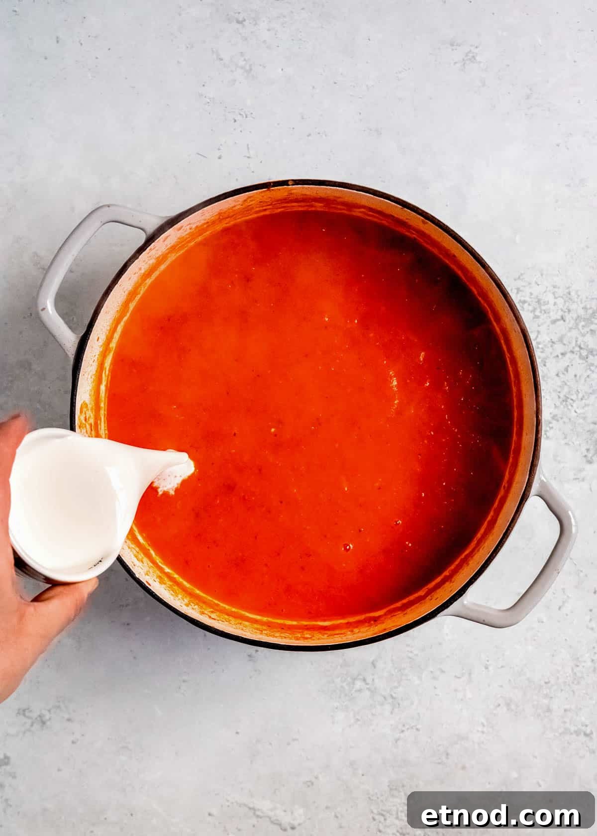 Creamy Roasted Red Pepper Soup with Garlic and Basil 12 heavy cream added to roasted red pepper soup