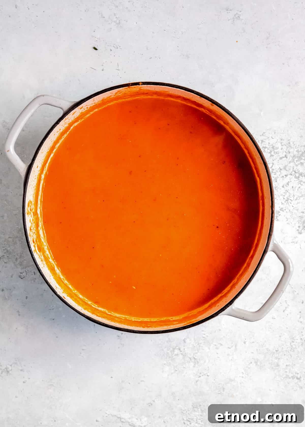 Creamy Roasted Red Pepper Soup with Garlic and Basil 13 stirred and finished AMAZING roasted red pepper soup recipe