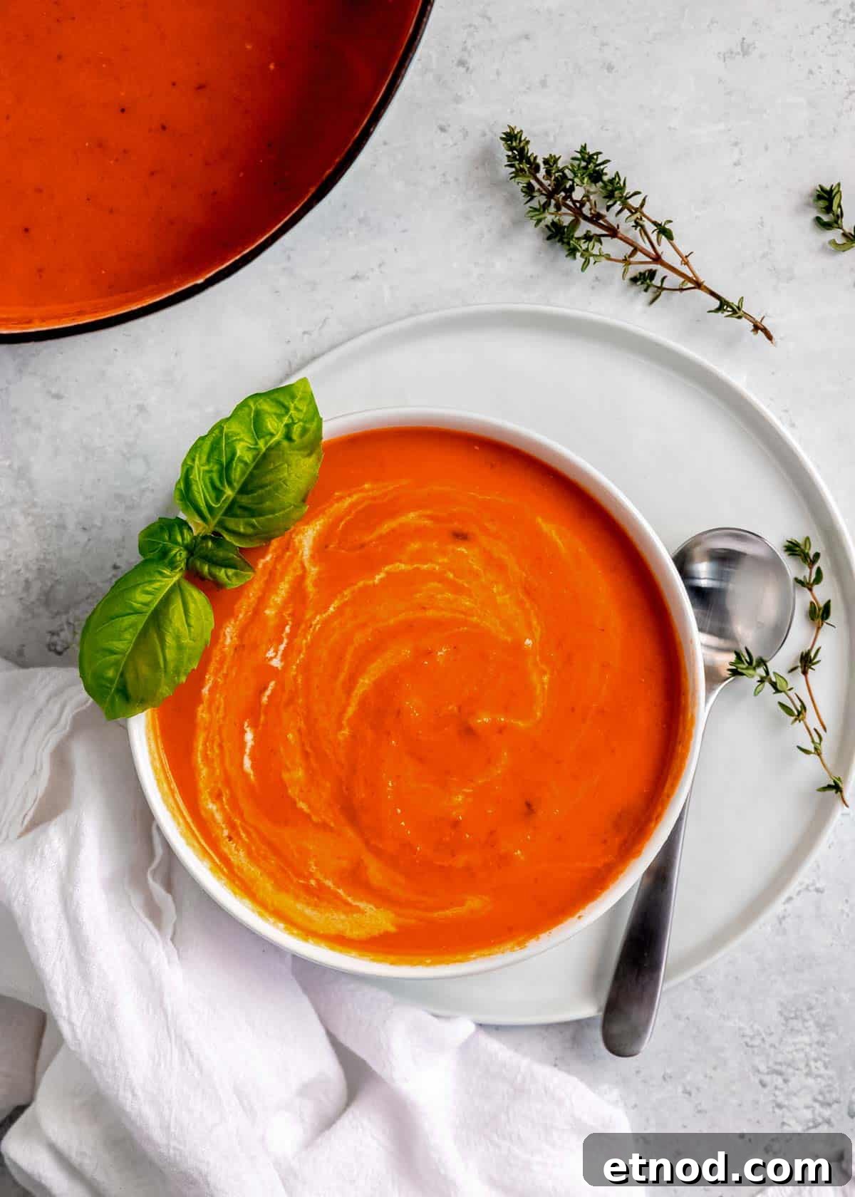 Creamy Roasted Red Pepper Soup with Garlic and Basil 14 a big bowl of the BEST roasted red pepper soup with basil and heavy cream and thyme