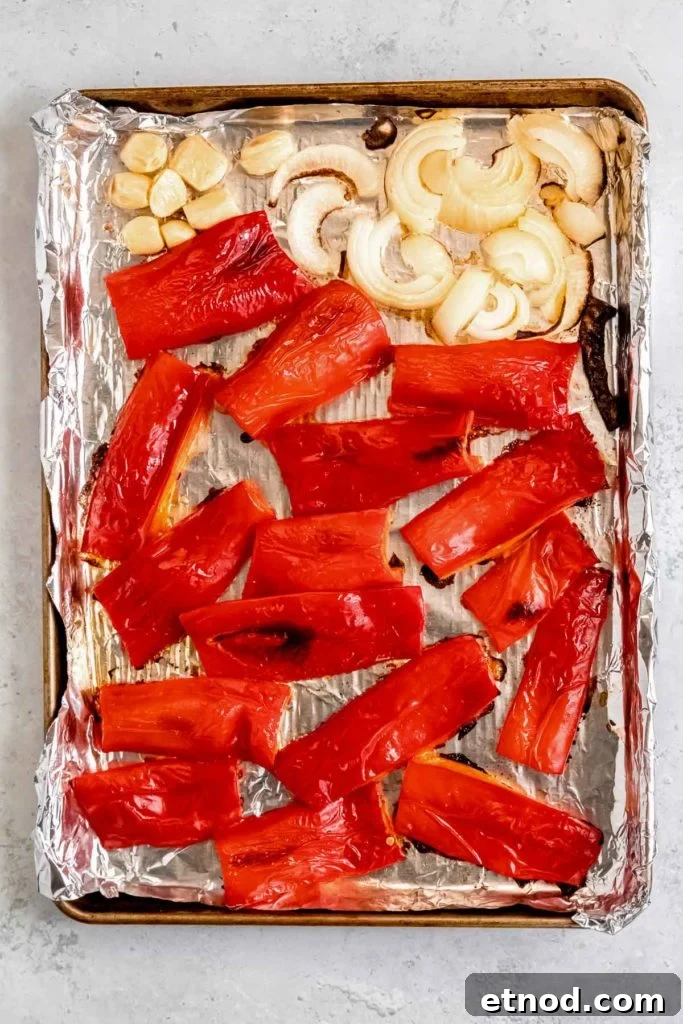 Creamy Roasted Red Pepper Soup with Garlic and Basil 5 charred and roasted red peppers, onions, and garlic