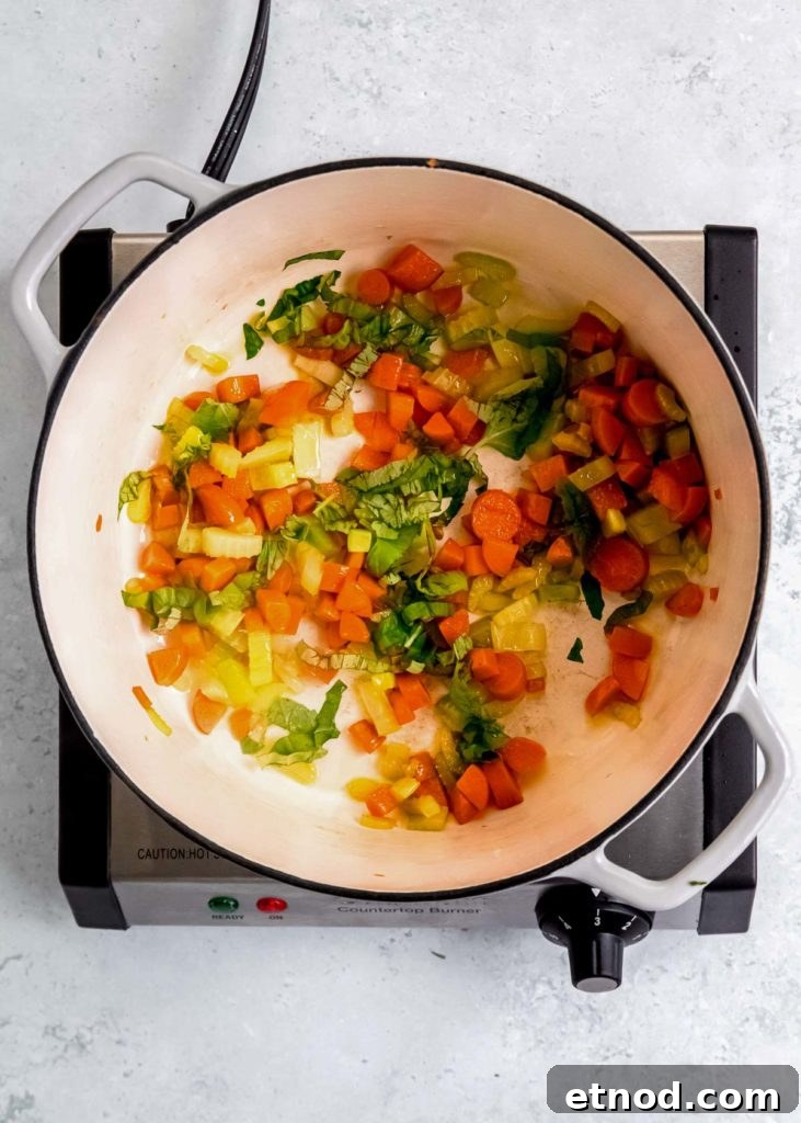 Creamy Roasted Red Pepper Soup with Garlic and Basil 7 sauteed carrots, celery, and basil