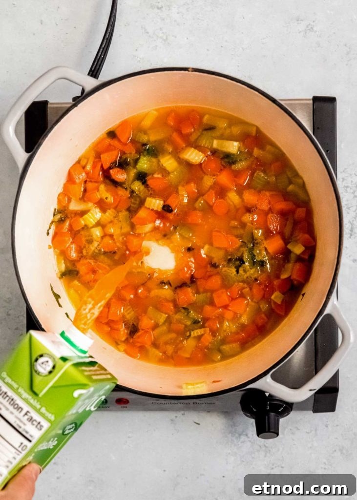 Creamy Roasted Red Pepper Soup with Garlic and Basil 8 broth added to dutch oven with sauteed veggies
