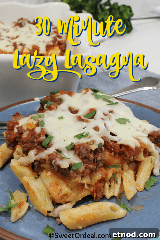 Cheesy pasta covered by a meat sauce and mozzarella.