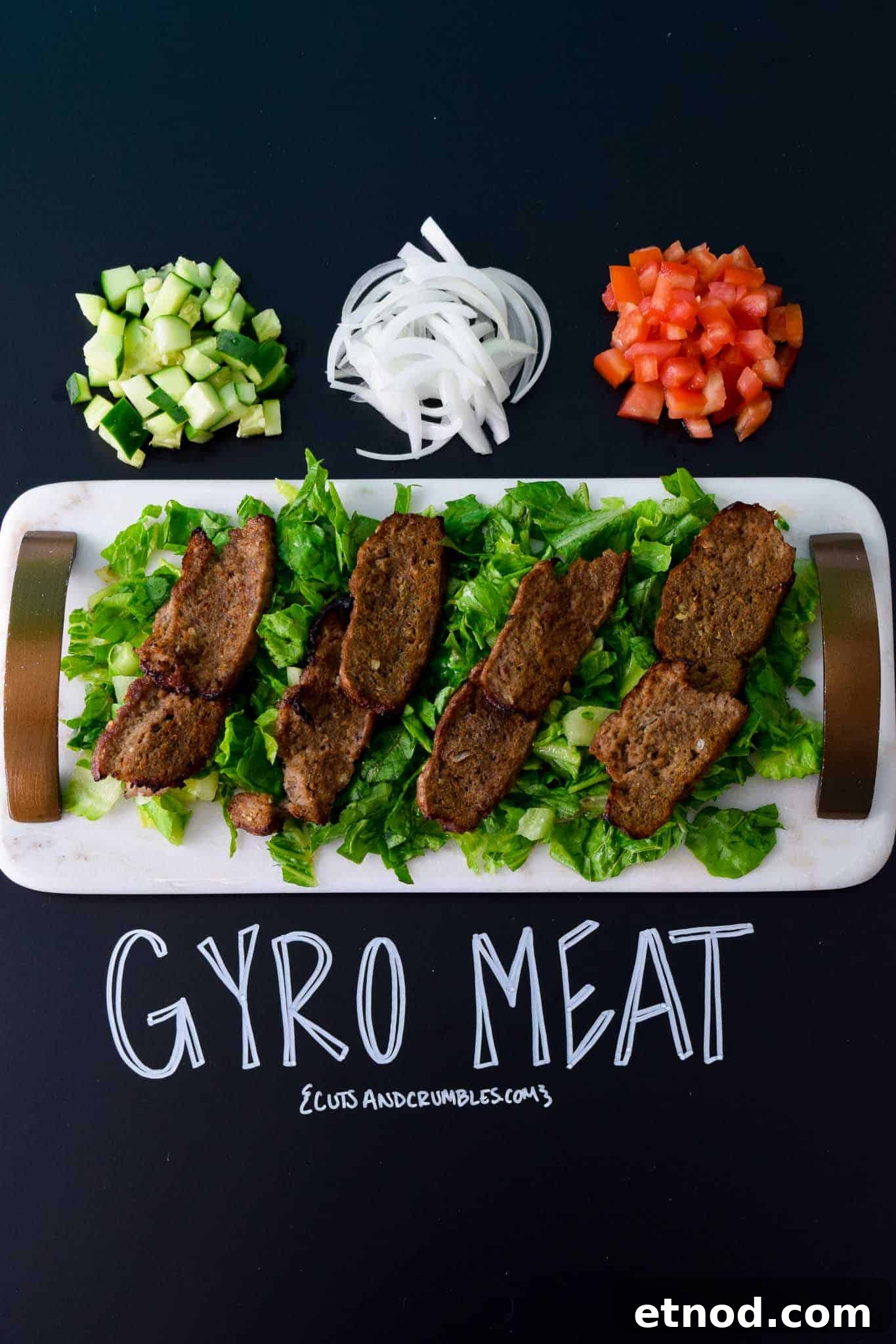 How to Make Authentic Gyro Meat at Home 2 Gyro Meat on white platter with title written on chalkboard
