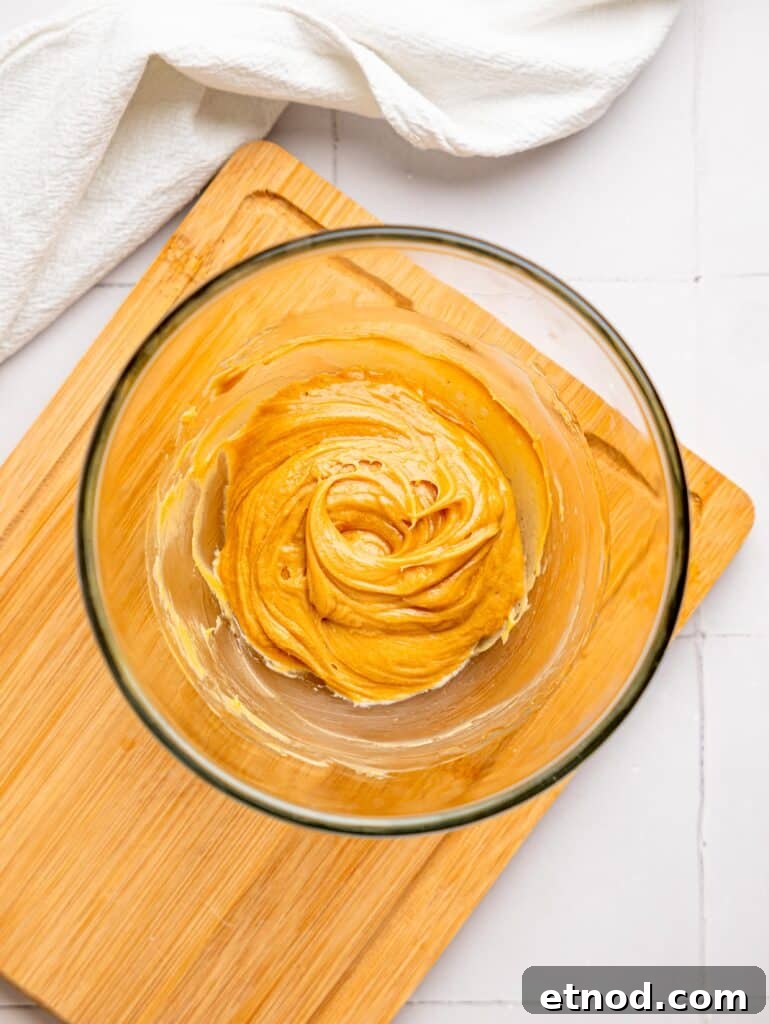 Bowl with peanut butter and liquid sweetener combined.