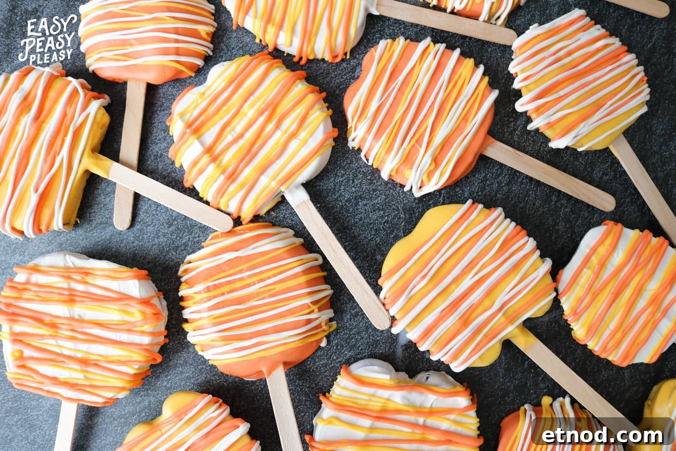 Easy 2 Ingredient Candy Apple Slices on a stick perfect for Halloween.