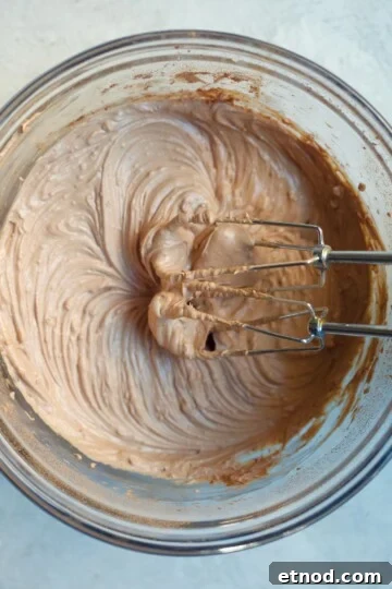Chocolate Cream Cheese Frosting Recipe with Reduced Sugar 4 beaters mixing frosting