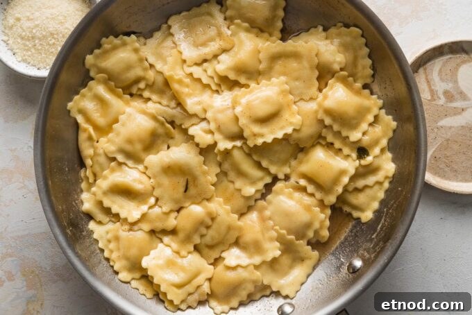 Brown Butter Ravioli with Roasted Butternut Squash Filling 8 Ravioli added to a skillet with browned butter.