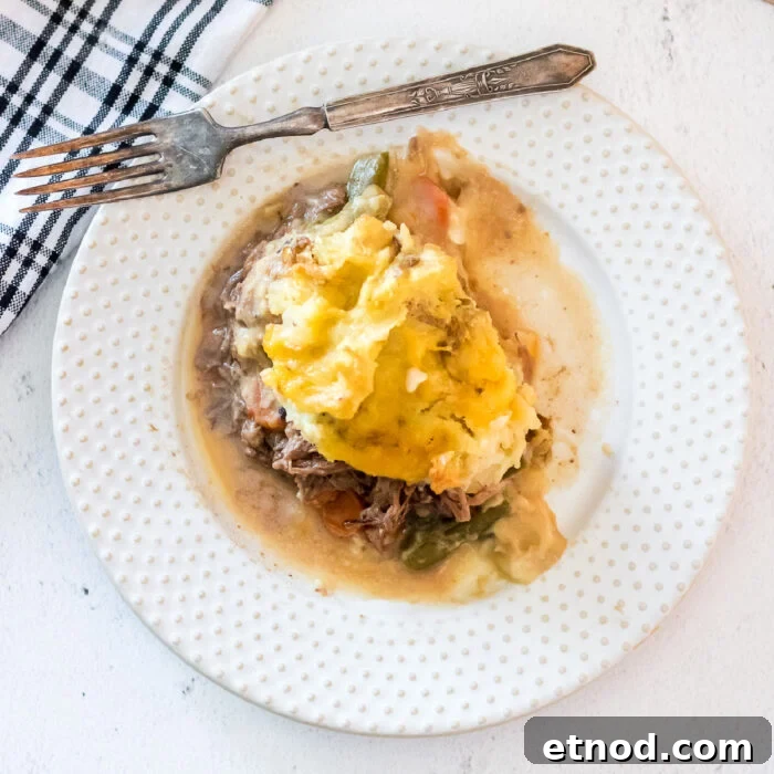 10 Simple Dishes You Can Make with a Can of Soup 11 Overhead view of a serving of shepherd's pie on a white plate.
