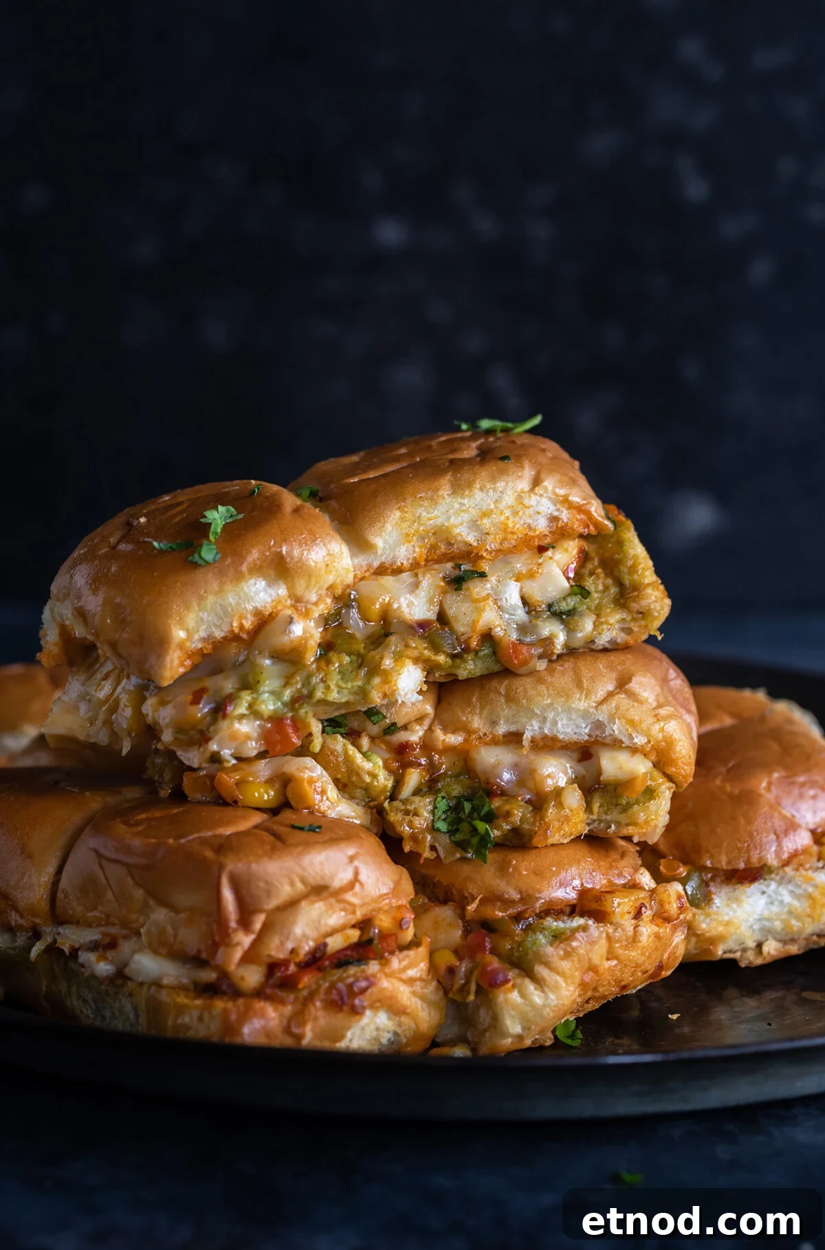 photo of paneer sliders stacked on top of each other