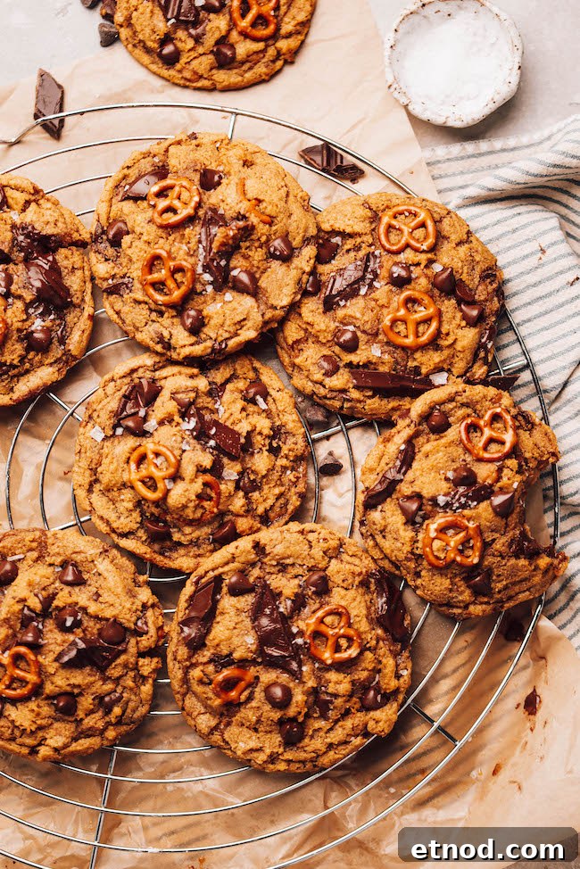 Kitchen-Sink Pumpkin Cookies That Melt in Your Mouth 3 cookies with mix-ins