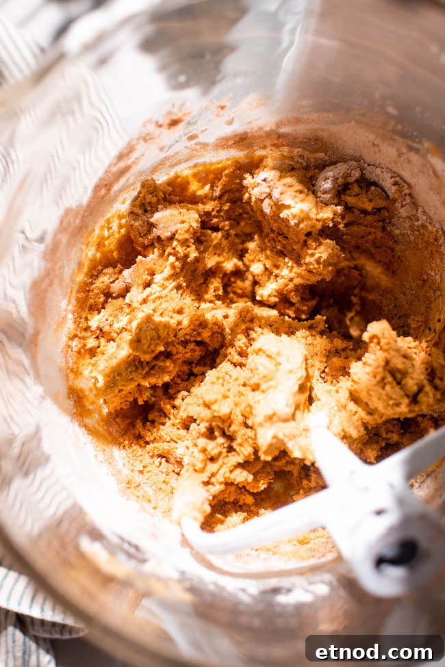 Kitchen-Sink Pumpkin Cookies That Melt in Your Mouth 9 cookies on sheet
