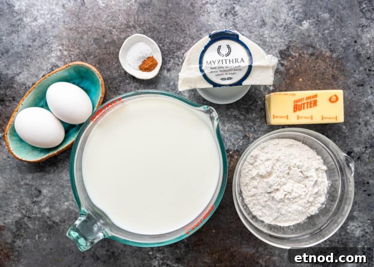 Authentic Greek Pastitsio Recipe: Classic Baked Pasta with Bechamel 7 large measuring cup of milk next to other ingredients for pastitsio white cheese sauce