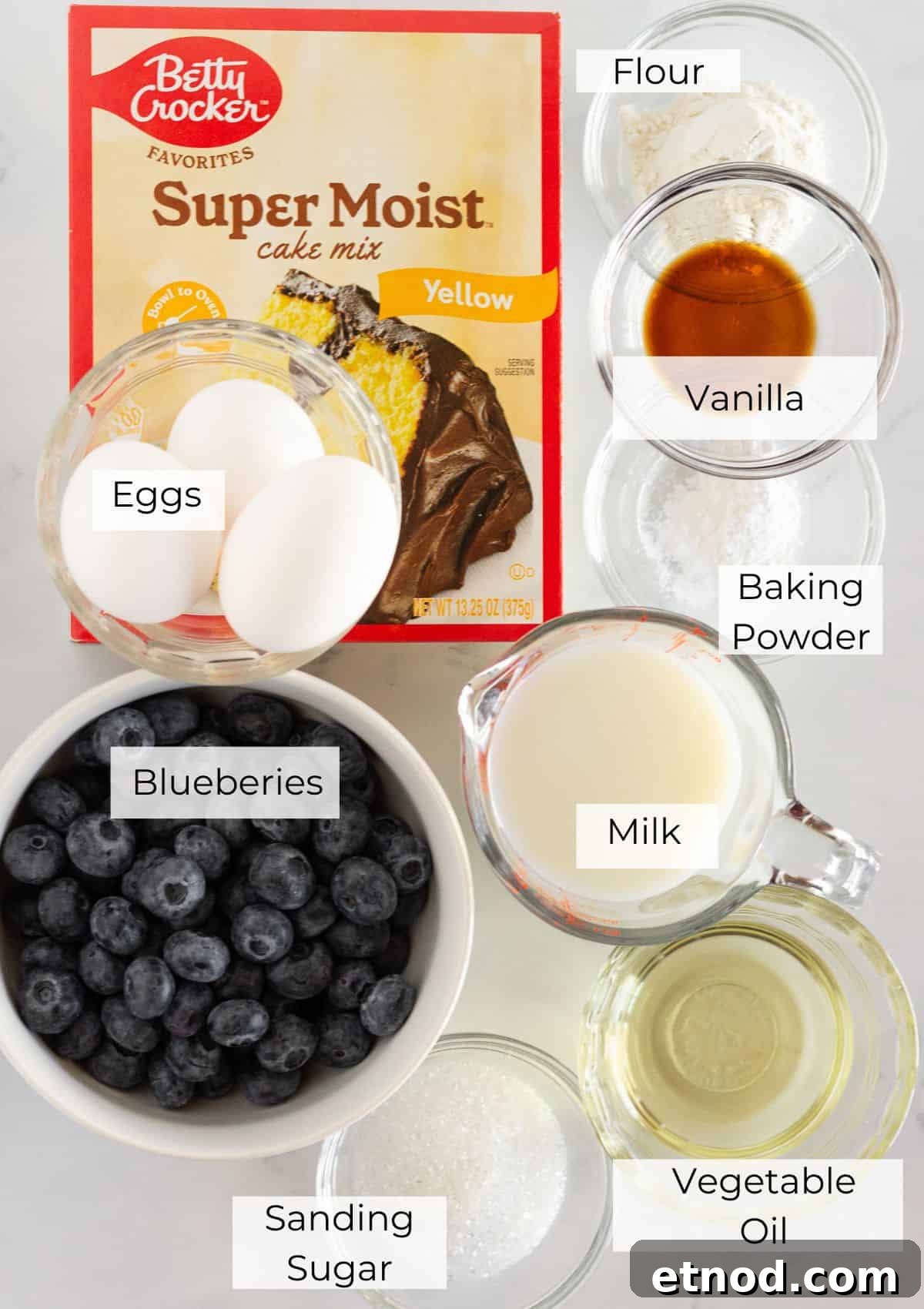 Quick Blueberry Muffins from Cake Mix — Moist & Tender Recipe 3 The ingredients needed to make blueberry cake mix muffins.