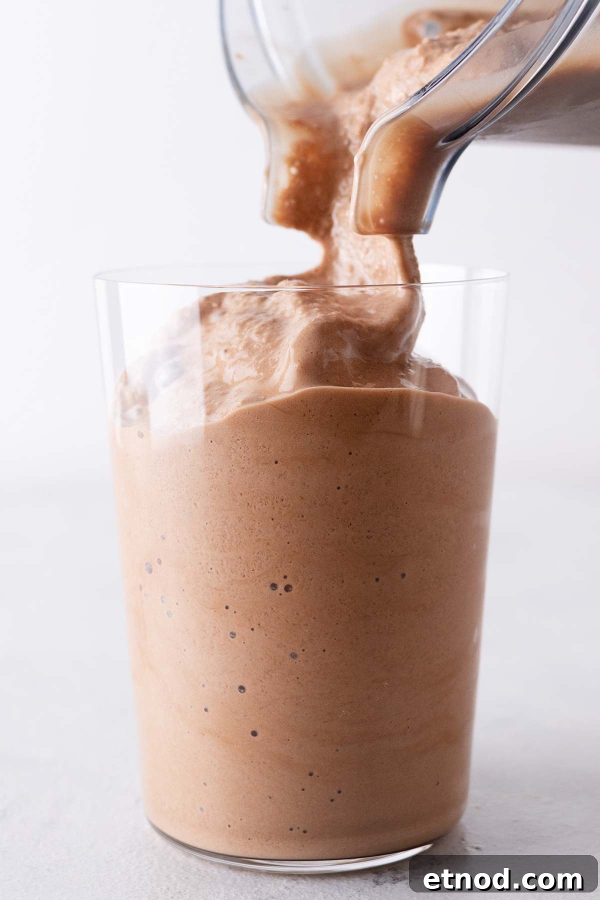 How to Make a Starbucks Mocha Frappuccino at Home 7 Frappuccino poured into a cup.
