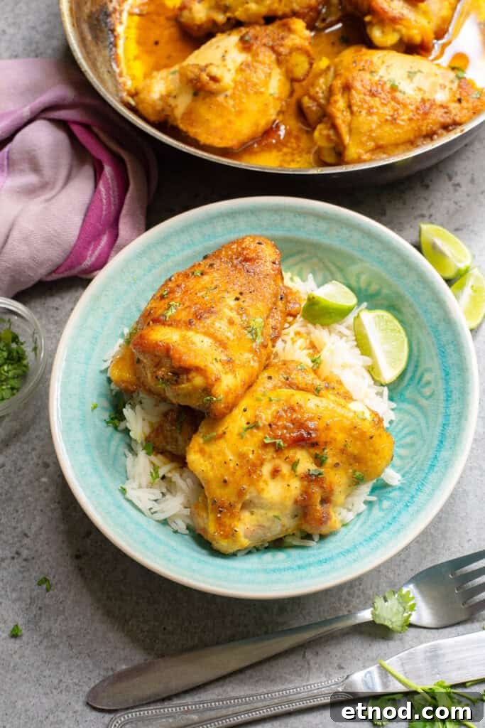 Turmeric Chicken Recipe: Flavorful Roast with Golden Spice 2 Turmeric Chicken in a blue bowl